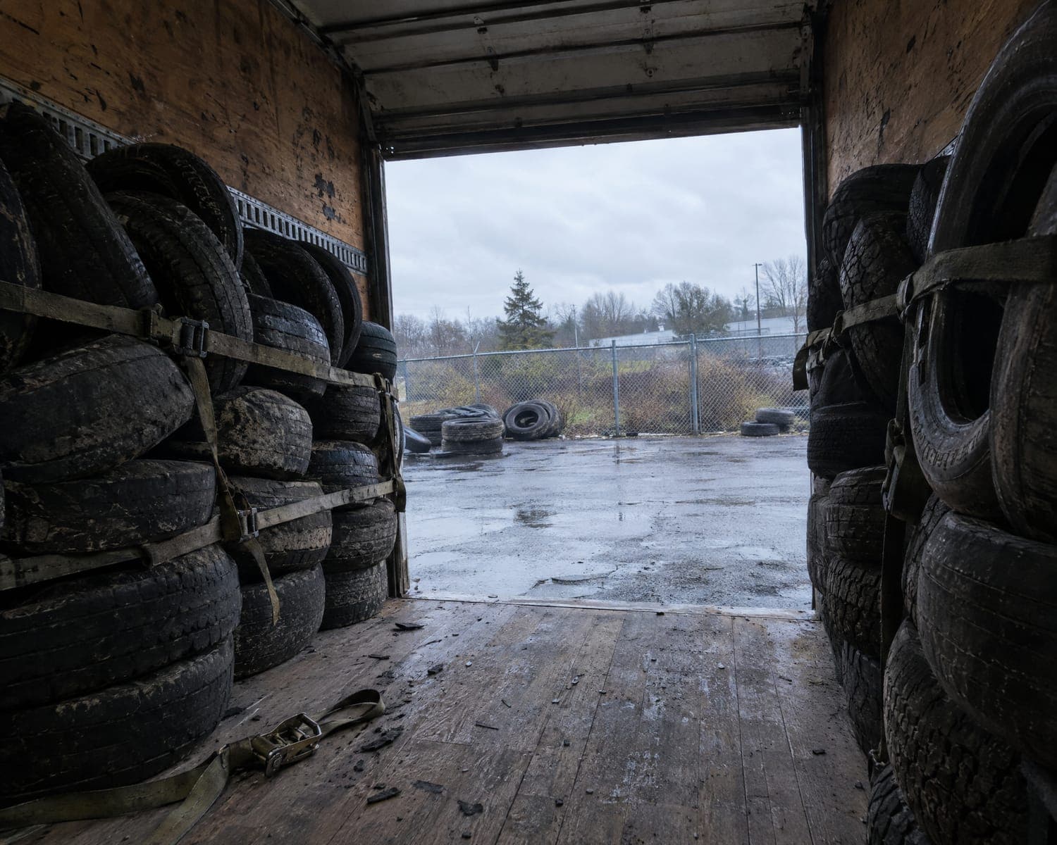 Scrap tires loaded in the back of a box truck